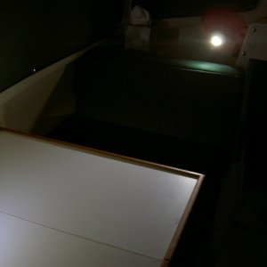 LED reading light illuminating dinette table.  No flash.