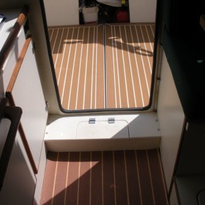 A view from the cabin showing the difference between PlasTeak (cabin) and PlasDeck (cockpit).  Good looking stuff and nonskid, too.