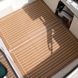 Another view.  This flooring is much heavier and thicker than PlasTeak, is UV-resistant and its non-skid qualities makes it feel almost tacky.  I don't think the cooler is going to slide around on this stuff.