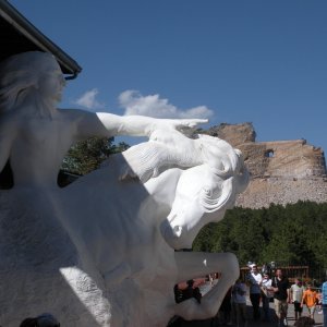 A scale model of Crazy Horse and the real thing in the backgound.