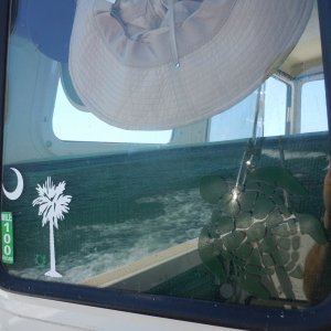 Trying to get creative by showing both the reflection and decals on the window.