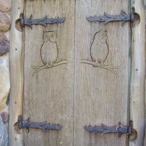 All the cedar shutters have different wildlife carvings - done by the same gentleman. He did all the work/craftsman/artist work - everything.