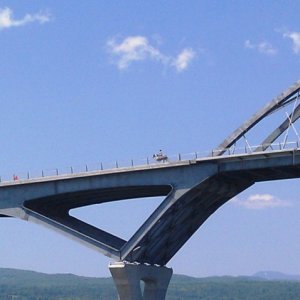 31.) Yes, that is a horseback rider on the bridge.