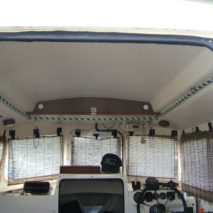 Media 'rope hand hold in U configuration - SS eye bolts (1/4 inch by 20 thread) replace 8 flat head bolts holding SS outer railings' in album 'custom drawer and separated storage below front seat'