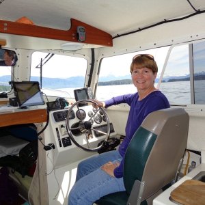 Mary loves to take the helm.
