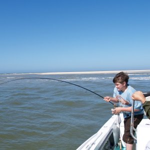 Media 'Brad, Guide Charles' grandson, hooks up with his first redfish!' in album 'On I-10 between Phoenix and Tucson'