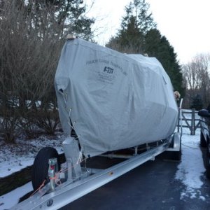 Fisher Canvas Products made the cover they are from Burlington New Jersey cover has vents pockets for three 2x4x10' The cover weighs around 70 pounds and will shrink a little in the coming weeks. I took the boat to him to get measured up but they do have patterns for 22' and 25's cost around 1200 dollars entrance door optional add 100