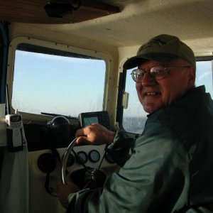 Media 'The Captain, at the helm of Captain's Choice' in album 'Captain's Choice Transit down ICW from Potomac River south to Albemarle Sound and return.  About a week in all.  Departed 18 October, returned 25 October 2003'