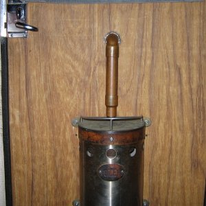 Force 10 Propane heater mounted on inside of door