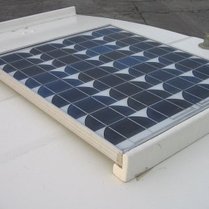 Solar panel mounted at rear of cockpit cover.