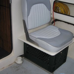 Cockpit seat, with battery box inside