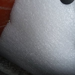 The machine screws are 1-3/4" long and are nutted to hold the hatch in place, then nutted again with fender washers to hold the insulation in place. The perimeter of the sheet insulation is wedged in place by fit and the reverse angle of the hull.