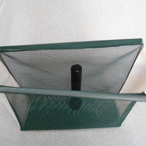 Media 'Since it doesn't include the word "marine" in the product description, it is very affordable.  I ordered it on EBay.' in album 'I credit my wife for introducing me to a fabric called "vinyl bag mesh". It is all plastic, mildew proof, machine washable, easily sewn, doesn't ravel, and is available in many colors.  The green matches my boat perfectly.'