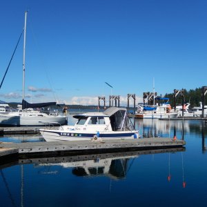 Media 'See-Saw and Lindy, with "boat-neighbors" at dock in Friday Harbor' in album 'Neil in Rose Bud II (right) and Rob in Robbie's Refuge (center,back), 
at dock in Cornet Bay near Anacortes, WA, 
waiting to cross to Friday Harbor in the San Juan Islands'