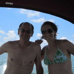 Media 'Rob with his daughter Robyn on our maiden voyage on PK Lake' in album 'Thanks to our kids in Texas for storing the boat from Florida, awaiting our arrival and towing rest of way to its new home.'