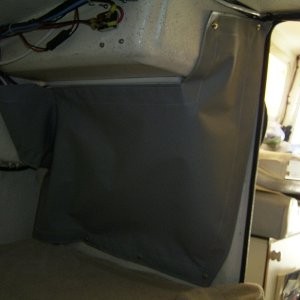 Vinyl cover for the electronics behind the helm. The factory fiberglass cover was a pain to remove and kept coming loose.