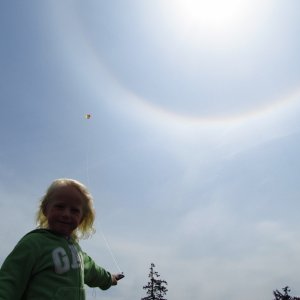 Aven enjoys the wind with her kite