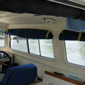 Starboard window covers rolled up