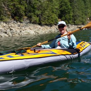 Caryn on brand new Advanced Elements inflatable kayak in Roscoe Cove