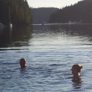 Martin and Caryn swimming in the warm waters of Melanie Cove