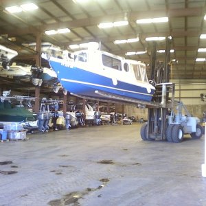 Good view of the Betty Ann being removed from the boat valet storage rack at Port Niantic