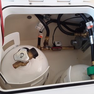 Media 'finished up, there is a 1/2 hole with a clamshell over it that leads to the splashwell for the drain' in album 'cutting out the drain for the livewell'
