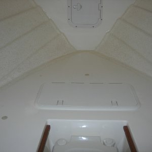 New 12x24" storage hatch in v-berth.  Hatch cover made by T-H Marine.