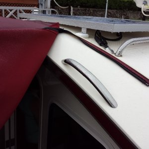 Handle fits nicely under bimini