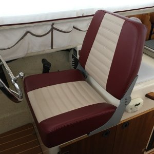 Media 'New custom helm seat from Bentley?s Mfg in Portland, OR.  This is their ?large? Sport Deluxe.  Well made, comfortable with good support, and easy to install.     It is soooo much better than the original seat!!!' in album 'New Drawers... each piece was modular and we actually ended up placing deeper drawers on the top parts of a less deep rack (to fit along the angle of the hull).     Note:  we have now been using these for ~7 years and still love them.   They still look and work like new with absolutely no signs for wear or rust.'
