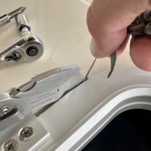I carefully cut out all the excess butyl and saved it because I can use it at a later time.
