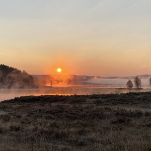 Sunrise over the Smokey Hayden Valley & the Yellowstone River running through it
