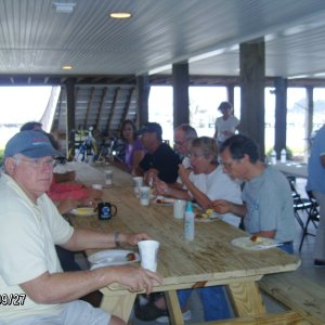 Sam,Bob and Anne chatting before breakfast.