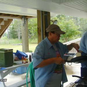 Paula and Bob cooking breakfast.