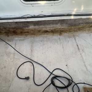 Used fiberglass mat and resin to fill in along base of bulkhead