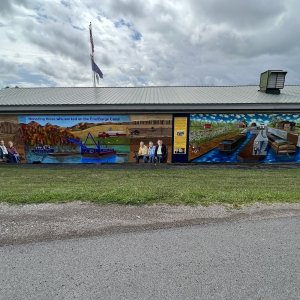 Mural on the back of a maintenance or office building at the Lyons dry dock facility