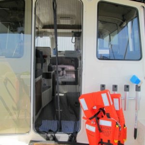 SOLAS approved Type 1 PFD'S, hard to find, try Landfallnavigation.com