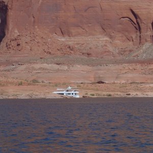 conspicuous consumption--houseboat with a helicopter on top