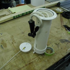 Raw water anchor and chain washdown system, made from 4" deckplate and 4" PVC drain  pipe and cap.