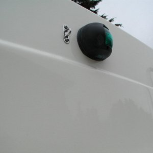 Media 'Eye pad for forward fender, reachable from cabin window.  No more trips forward for the mate.' in album 'Sooner or later, we'll be towing something or someone.  A Wichard towing eye to R. of Dive Ladder bracket. Sailboat gear but very heavy duty.'