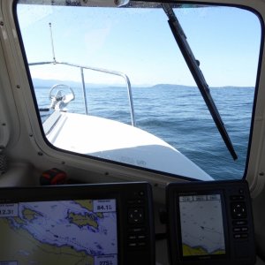 Media 'Looks flat calm but was actually bouncing along over the 4-5 foot swells coming down the strait.' in album 'Waiting out the winds, again. This time from peaceful Schooner Cove Monday morning.'