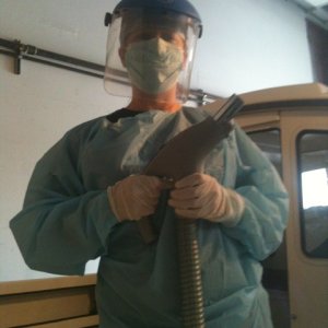 Rachel all geared up to tackle any fiberglass debris that comes her way. I was in short sleeves caked in 4200.