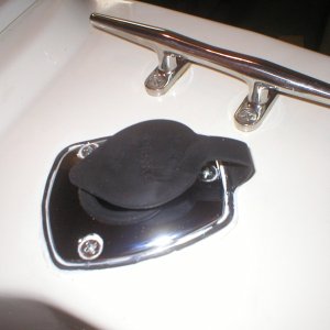 Finished lazarette rod holder mount/tube for groundfish jigging and ready to accept a downrigger gimbal insertion for trolling when needed.

Existing stern cleat for snapping in rod/reel if one should be nervous...