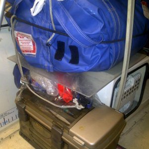 passenger seat mount now holds survival raft (blue bag)