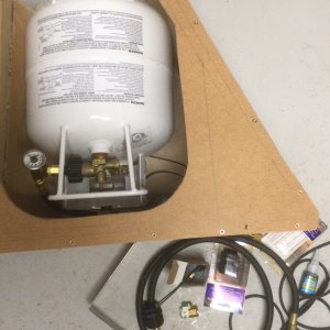 I'm modifying each lazarette to hold a 5 gal. horizontal propane tank. Starboard tank for heater and stove. Port tank for BBQ. Problem: Existing lockers are too small. Solution: Make them bigger. This means not just the interior of the locker, but the opening as well. I also wanted the opening to match the profile of the original hatch opening so, although it will look a little different from the original, it won't look like it wasn't part of the original design. I started with a mockup of the enlarged interior to make sure everything needed to meet ABYC guidelines will fit inside.