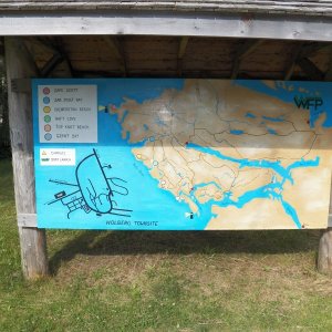 I like this map.  No "you are here" indicated.  No "north" indicated.  After walking around "town" and seeing where the shop and pub were located, you could then come back to the map and it made more sense.