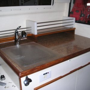 Media 'New laminate counter top and raised rack, new faucet' in album 'Mounting plate for Webasto mounting bracket'