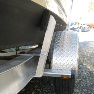 Media '5 ft side rails were custom fabricated and I find them essential. Makes a difference on a tilted ramp, x wind, current, etc.' in album 'Sea Wings Transom Wedge'