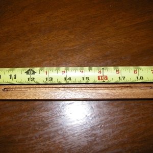 Side view of AC power panel top guide