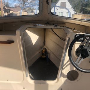 Had to drop the front bulkhead to access the area of damage on the aft side of the hatch. Front bulk head held on by a sealant and screws. Not sure if sealant was factory original or not.