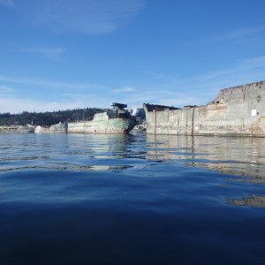 Hulks used as breakwater for mill